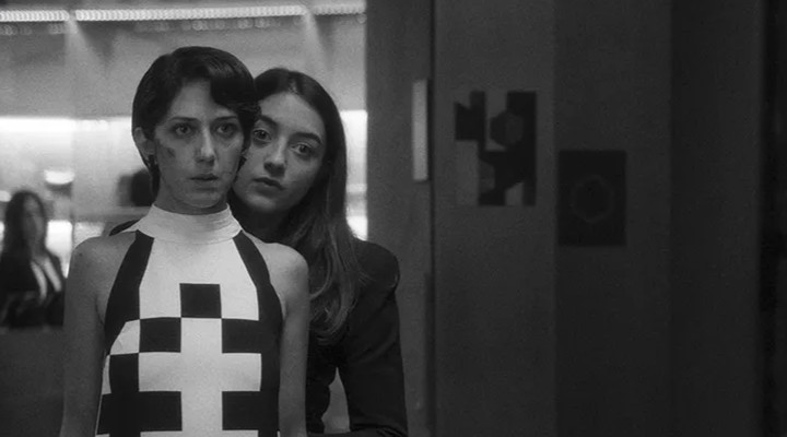 Двоє людей, що обмінюються слиною (Deux personnes échangeant de la salive)